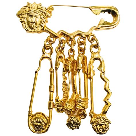 versace safety pin bag|Versace pin brooch.